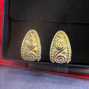 Gold tone pierced earrings with embossed design, pierced